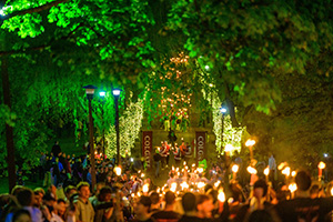 People walking outside at night