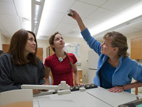 A teacher explaining an experiment to two students. Links to Gifts of Cash, Checks, and Credit Cards A teacher explaining an experiment to two students. Links to Gifts of Cash, Checks, and Credit Cards